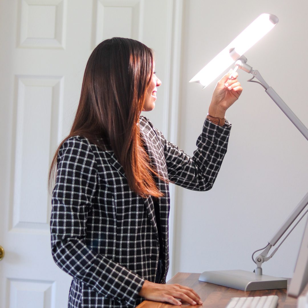 Person adjusting LumenX in white